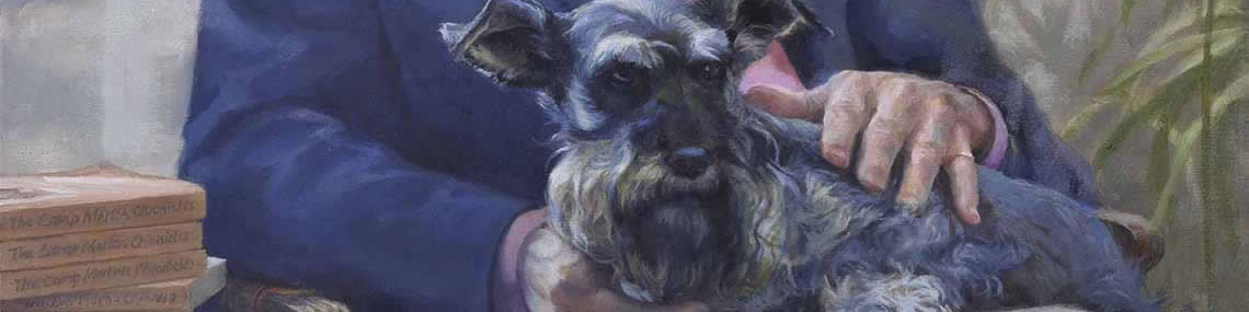 Scottish Terrier on the lap of a man