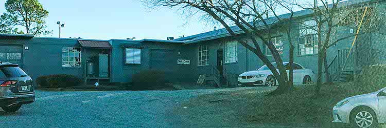 view of Artisan Resource Center courtyard parking area