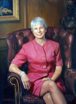 oil portrait of a gray-haired woman smiling in her magenta dress while seated in a formal leather wing-backed chair